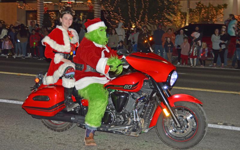 (ARCHIVE PHOTO | THE GRAHAM LEADER) The Grinch rides a motorcycle in the 2022 lighted Christmas parade on the Graham downtown square. The event this year will be held at 7 p.m. Thursday, Nov. 30. Alongside the parade is the stroll and Hot Chocolicious competition.