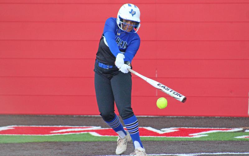 (TC GORDON | THE GRAHAM LEADER) Graham’s Paris Tate hits the ball with a slap hit and puts it in play for the Lady Blues in their 3-1 win over Stephenville this past Wednesday, April 10.
