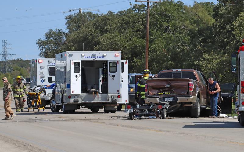 (THOMAS WALLNER | THE GRAHAM LEADER) A two-vehicle wreck Saturday six miles east of Graham on U.S. Hwy. 380 resulted in the death of a Newcastle woman and two others being transported to Graham Regional Medical Center.