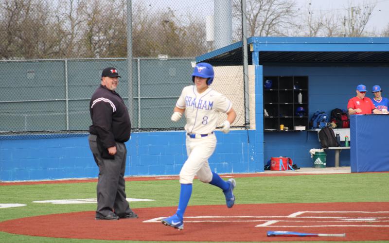 (MIKE WILLIAMS | THE GRAHAM LEADER) Harrison Brockway scored the only run during their 11-1 loss to Parish Episcopal Dallas Saturday, March 11 at Krum High School.