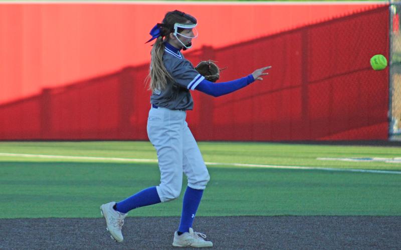 (TC GORDON | THE GRAHAM LEADER) Second baseman Tiffany Cotter makes an easy throw to first base to record an out during Graham’s 12-0 district win over Mineral Wells this past Tuesday, April 2.