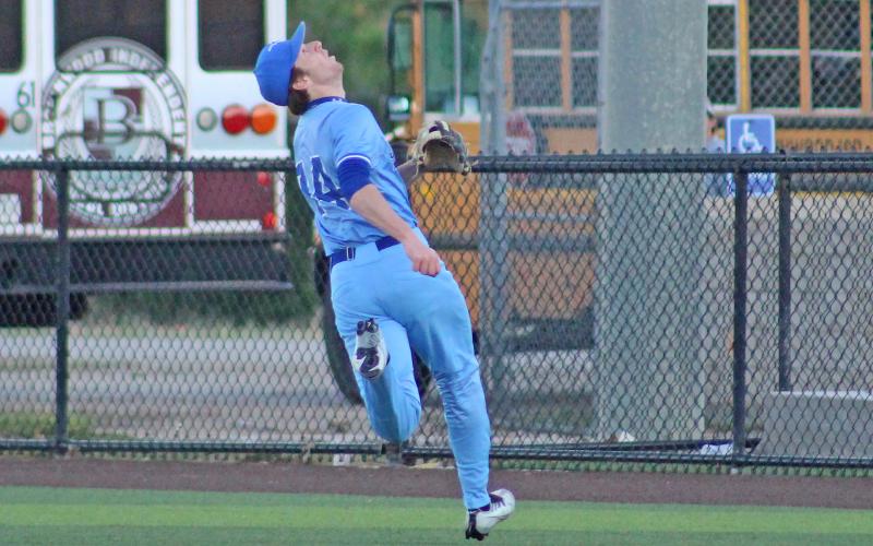 (TC GORDON | THE GRAHAM LEADER) Graham second baseman Tate Loesch tracks a ball in the air and tries to make an out during one of the team’s games earlier this week. The Steers traveled to Glen Rose but came back with a 10-1 loss Tuesday, April 9.