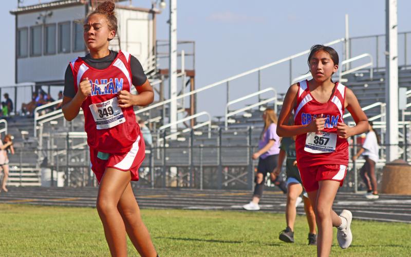 (KYLIE BAILEY | THE GRAHAM LEADER) Zoe Houston (349) finished 196th, with Emily Reyes Sanchez (357) finishing 195th, out of 216 runners Wednesday, Sept. 20 at the Wyatt Dickerson Invitational in Alvord.