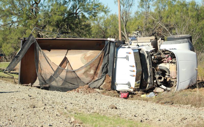 (TC GORDON | THE GRAHAM LEADER) A vehicle rollover wreck occurred Wednesday, Nov. 15 on FM 209 before Holcomb Lane.