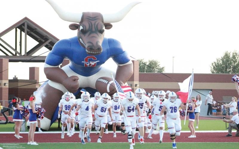 (ARCHIVE PHOTO | THE GRAHAM LEADER) The Graham Steers take the field in their season opening matchup against the Bowie Jackrabbits. The Steers would go on to dominate the Jackrabbits, 56-14.