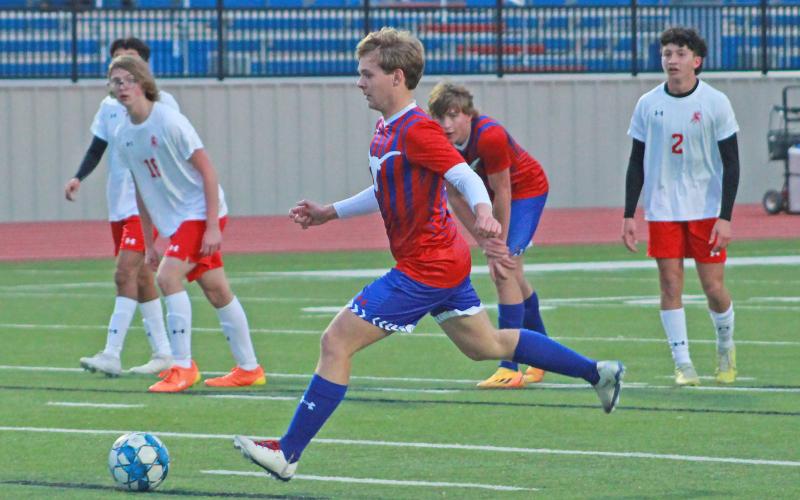 (TC GORDON | THE GRAHAM LEADER) Graham senior Holton Weatherman takes a penalty kick for the Steers and scores their first goal of the match in a 7-0 win Friday, Jan. 5 over Sweetwater.