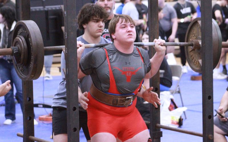 (TC GORDON | THE GRAHAM LEADER) Bennett Coley, of the Steers powerlifting team, completes his squat lift during the team’s competition at Weatherford last Thursday, Jan. 11.