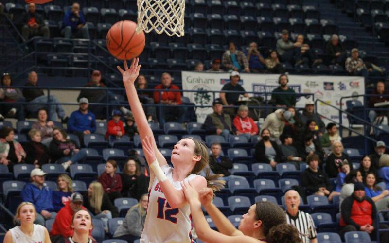 (TC GORDON | THE GRAHAM LEADER) Senior Hannah Williams attempts a layup during Graham’s game Friday, Jan. 12 against Brownwood. The Lady Blues won 39-30 with Williams leading the team in scoring with 10 points.