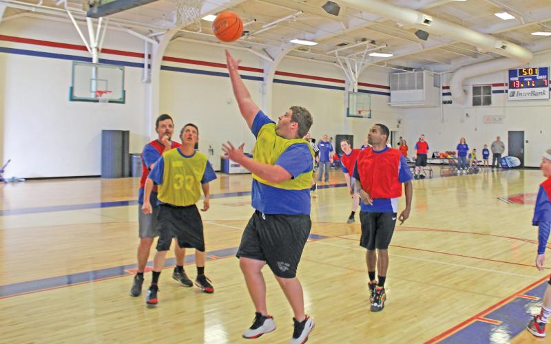 (ARCHIVE PHOTO | THE GRAHAM LEADER) A participant in the 2023 Special Olympics basketball competition in Graham goes up for a shot. The event this year will be held from 8 a.m. to 1 p.m. Saturday, March 2.