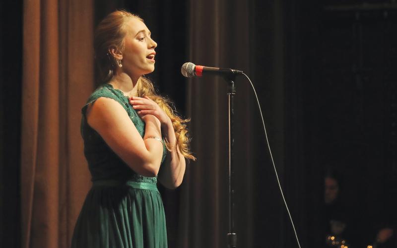 (THOMAS WALLNER | THE GRAHAM LEADER) Abrianna Clay sings during the talent portion of the All-American Girl Pageant held Saturday, Feb. 24 at Memorial Auditorium. 