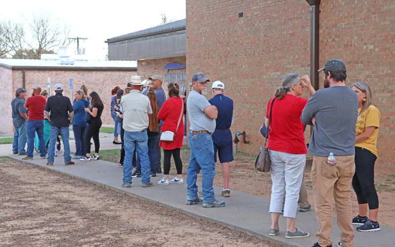 (THOMAS WALLNER | THE GRAHAM LEADER) Voters line up outside the North Central Texas College polling location on election day for the March primaries. 
