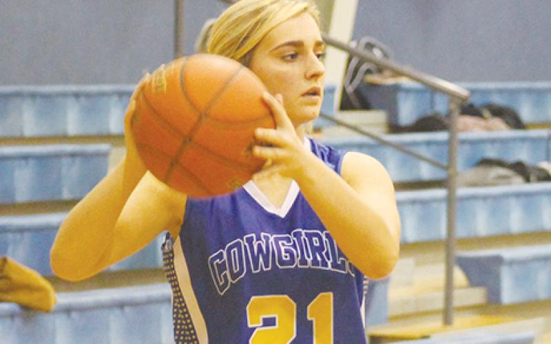 Bryson’s Hope Guttery scored seven points Friday night as the Cowgirls dropped a district contest against Graford 41-34, moving them to 1-2 in district. Leader photo by Evan Grice