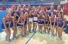 (CONTRIBUTED PHOTO | MCKENZIE SHOOK) The Graham High School cheer team attended an NCA camp at SMU and earned multiple awards for its performances. The Graham cheer team earned two “excellence” ribbons and one “superior” ribbon for their performances.