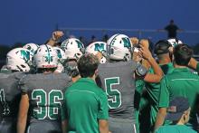 (FILE PHOTO | THE GRAHAM LEADER) The Newcastle Bobcats huddle during their Homecoming win over Azle Christian. The Bobcats suffered their first loss of the season Friday, Sept. 15.