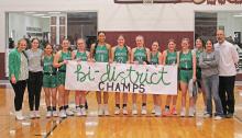 (TC GORDON | THE GRAHAM LEADER) The Newcastle Ladycats earned a bi-district championship Monday, Feb. 12 with a 54-20 win over Bellevue. The Ladycats will progress in the playoffs with an area round matchup to be determined. 