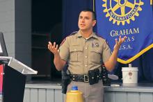 (THOMAS WALLNER | THE GRAHAM LEADER) DPS Sergeant Juan Gutierrez speaks Tuesday, April 2 with the Rotary Club of Graham to share safety tips for drivers. Gutierrez was joined by TxDOT Traffic Safety Specialist Tish Beaver.