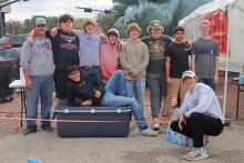 (THOMAS WALLNER | THE GRAHAM LEADER) The Smokin’ Steers and Graham PitSteers teams representing Graham High School at the High School BBQ regional competition held Saturday, Nov. 18 on the Graham downtown square.