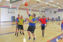 (ARCHIVE PHOTO | THE GRAHAM LEADER) A participant in the 2023 Special Olympics basketball competition in Graham goes up for a shot. The event this year will be held from 8 a.m. to 1 p.m. Saturday, March 2.