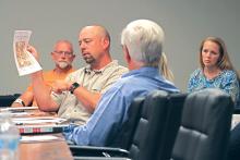 (THOMAS WALLNER | THE GRAHAM LEADER) Zach Husen, Graham Area Engineer for the Texas Department of Transportation, speaks Tuesday, Aug. 29 during the city of Graham Transportation Improvements Committee meeting regarding safety improvements on Oak Street for Open Door Christian School.