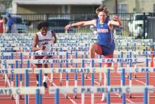 (MIKE WILLIAMS | THE GRAHAM LEADER) Graham Junior High School eighth grader Andon Masterfield (pictured in the 100-meter hurdles) took first place the 100-meter hurdles, 300-meter hurdles, 4x400-meter relay, long jump and triple jump during the GJHS track meet Tuesday, March 28.