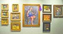The artwork named Best of Show  in the annual Lake Country Art Show is Sierra, an oil painting by Colleen Erickson, shown at center. (Leader photo by Thomas Wallner)