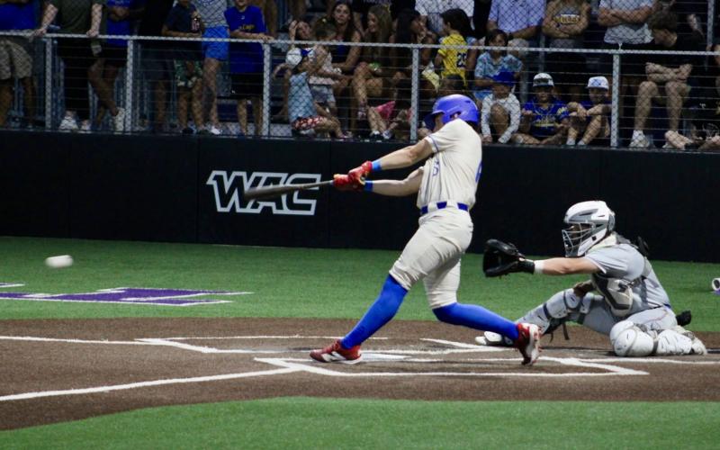 (ALEX HAVARDANSKY | THE GRAHAM LEADER) Tripp Mahaney makes contact with a pitch Thursday, May 22 for a base hit. Mahaney led a potential scoring opportunity in the bottom of the sixth. 