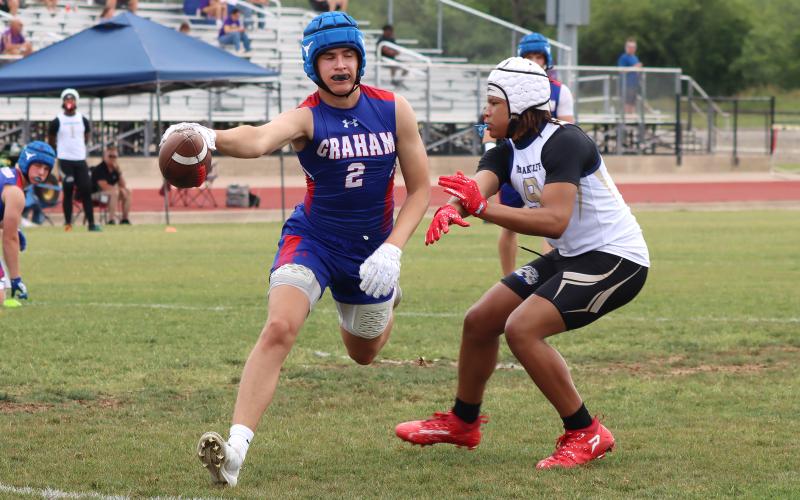 (THOMAS WALLNER | THE GRAHAM LEADER) Walker Bennett runs in for a touchdown against Dallas Life Oak Cliff at the Mineral Wells State Qualifying Tournament for 7on7 held Friday, May 22. The Steers beat Dallas Life Oak Cliff, Godley, Krum and Stephenville to advance to the state tournament in June.
