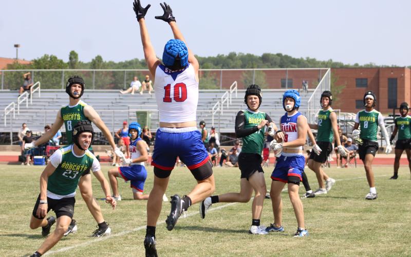 (ALEX HAVARDANSKY | THE GRAHAM LEADER) Thomason Burkett picks off a pass for another touchdown Saturday, May 24 against the Lubbock Christian Eagles. Burkett picked off passes on back to back drives to secure a 19-13 win in the matchup. 