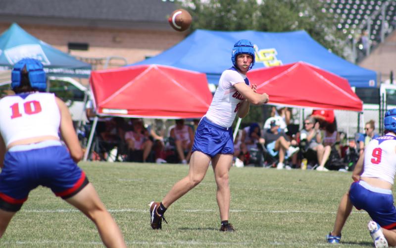 (ALEX HAVARDANSKY | THE GRAHAM LEADER) Jace Gill finds Brody Martin on a pass Saturday, May 24. Gill passed for four touchdowns in the Steers matchup against Benbrook. 