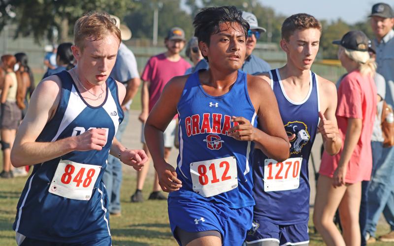 (KYLIE BAILEY | THE GRAHAM LEADER) Alexis Rincon tries to keep ahead of the field at the Thrill of the Hill Invitational. Rincon finished 122 out of 166 runners in the boys 5K event. 