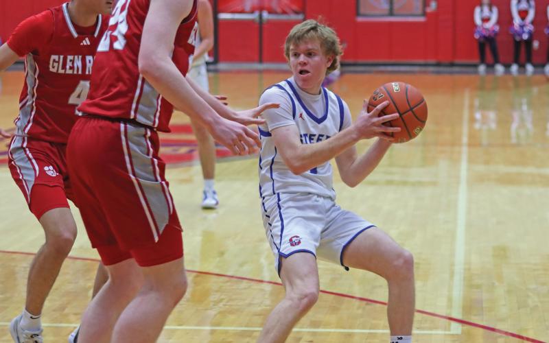 (THOMAS WALLNER | THE GRAHAM LEADER) Tyler Allen has been an asset for the Graham Steers with his speed on the court matching his skills at the net. In the district matchup Tuesday, Jan. 21, Allen helped play a role along with his teammates in the second half and showed that the Steers never give up despite the odds.