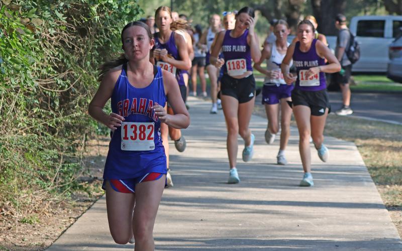 (PHOTO BY LIAM BAILEY) Anzley Howard separates from runners during the two mile run Wednesday, Aug. 27. Howard finished in 148th place during the event. 