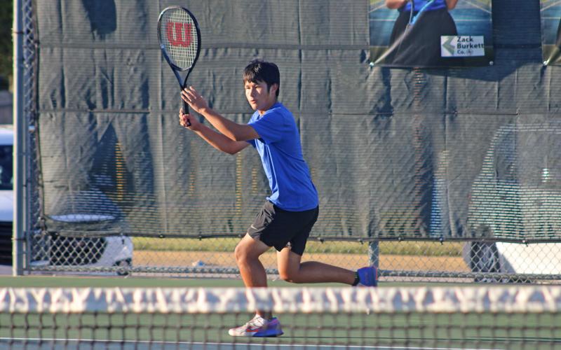 (ALEX HAVARDANSKY | THE GRAHAM LEADER) Brodey Mills prepares to swing at a ball Wednesday, Sept. 24, against Bowie. Mills won his singles match at the top of the Steers leaderboard.