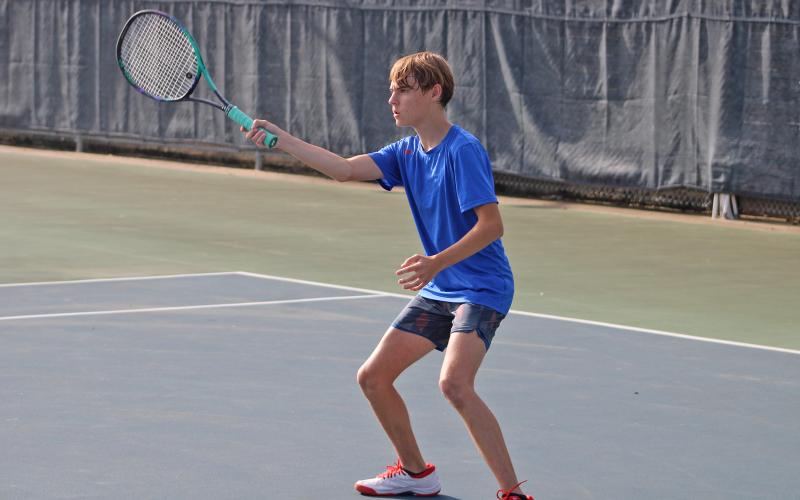 (ALEX HAVARDANSKY | THE GRAHAM LEADER) Raife Bishop defends the front court Saturday, Aug. 2. Bishop and his teammate Jordan Miranda picked up the lone Steers doubles win 8-4. 