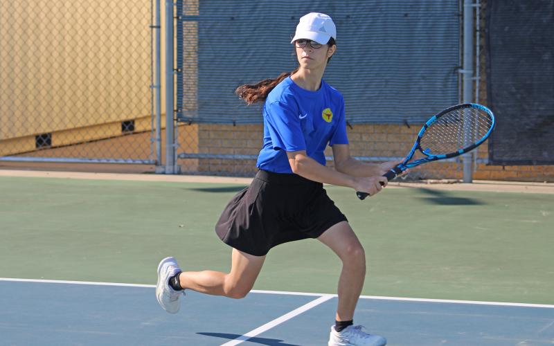 (ALEX HAVARDANSKY | THE GRAHAM LEADER) Stacey Gonzalez runs after a ball Saturday, Aug. 2. Gonzalez picked up another singles win against Brownwood 8-4. 
