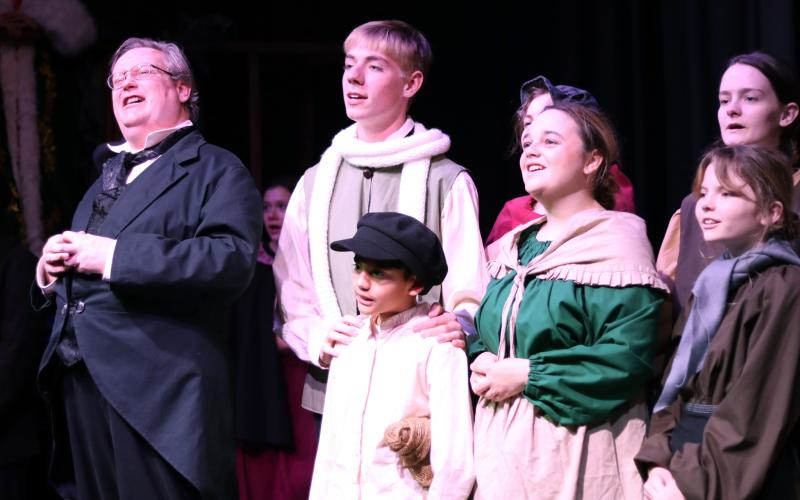 (ARCHIVE PHOTO | THE GRAHAM LEADER) Actors in the Graham Regional Theatre production of ‘A Christmas Carol’ end a show at The Perry theatre in Graham. The Christmas tradition will return to the downtown square with performances from Dec. 19-21.
