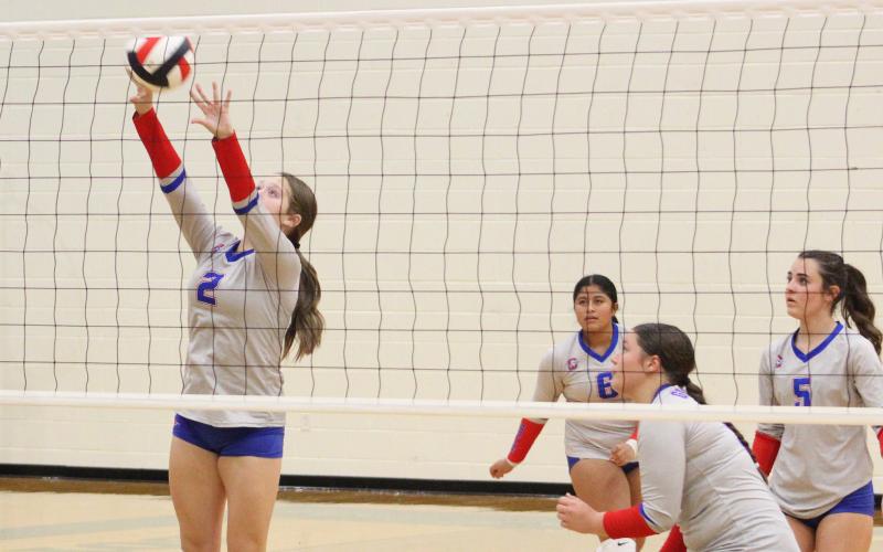(ALEX HAVARDANKSY | THE GRAHAM LEADER) Collins Weil goes up to set a ball Tuesday, Aug. 26, against the Lady Jackets. The Lady Blues defeated the Lady Jackets in three sets.