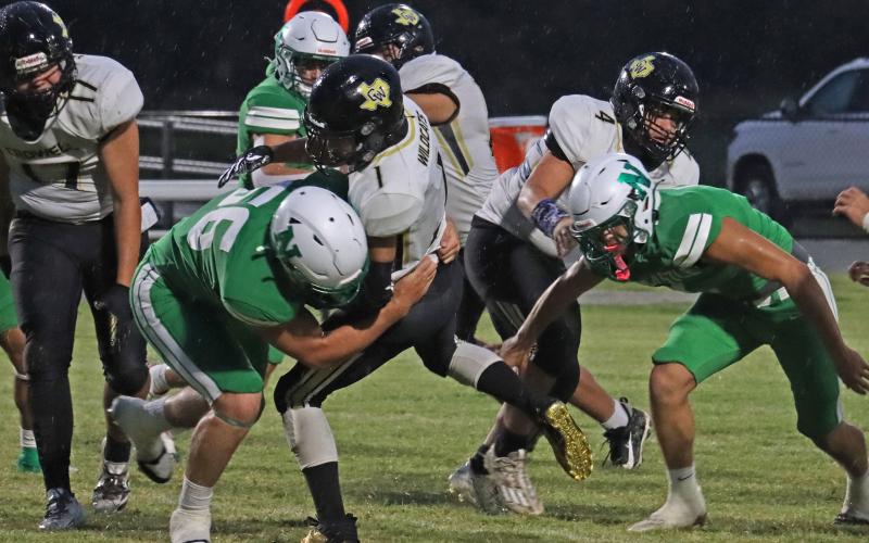 (THOMAS WALLNER | THE GRAHAM LEADER) Cooper Clayton takes a player to the ground for a tackle on defense. Clayton recorded the lone receiving touchdown in the Bobcats 63-0 win over the Gold-Burg Bears.