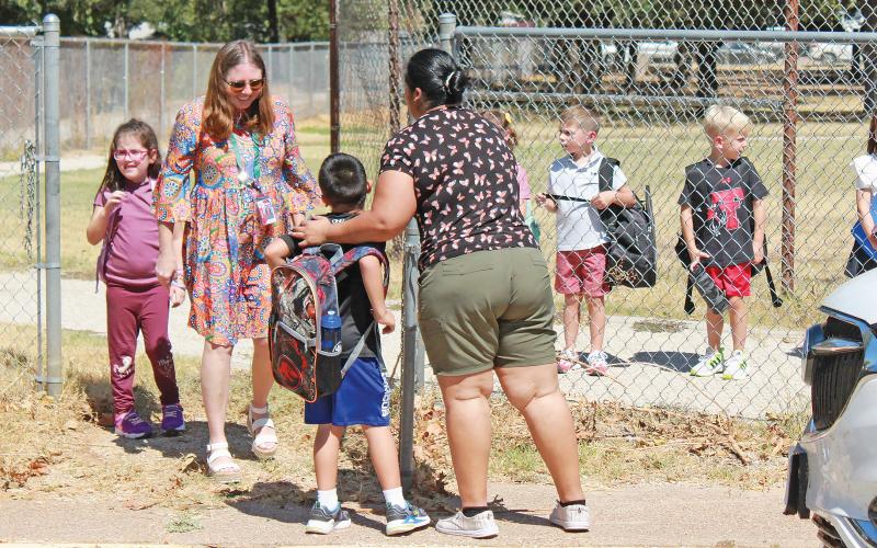 (ARCHIVE PHOTO | THE GRAHAM LEADER) Students from Crestview Elementary School are picked up on the first day of school in 2023-2024 school year. This week, area schools canceled classes due to abundance of  staff and student absences. 