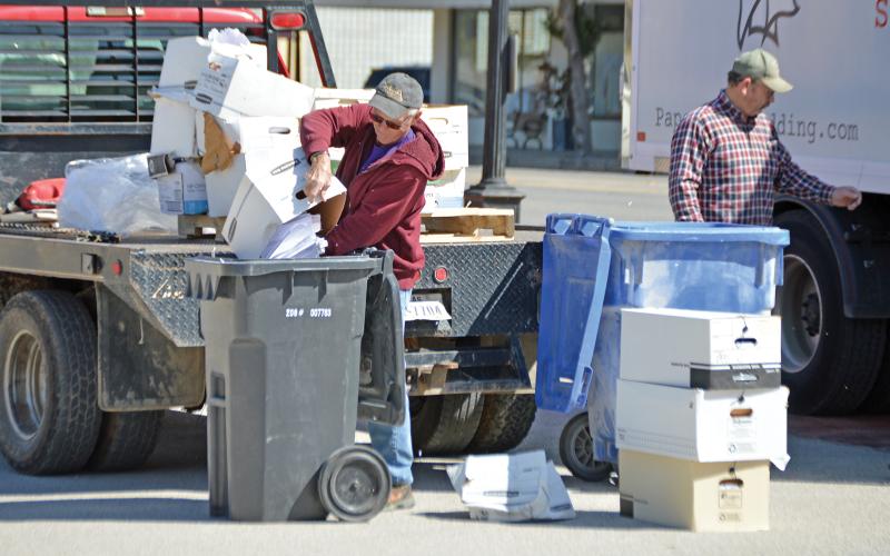 (ARCHIVE PHOTO | THE GRAHAM LEADER) Brad Partridge helps unload papers to be shredded during the 2023 spring clean up event. The event this year will be held from Saturday, April 5 through Sunday, April 13. 