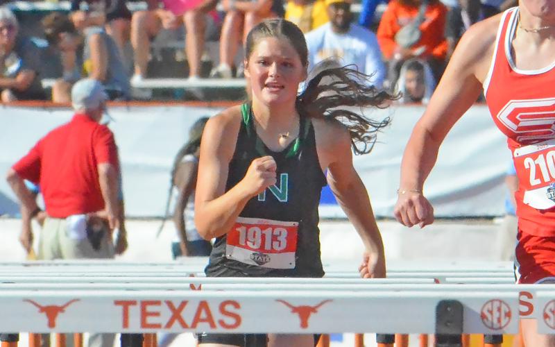 (COLTON MCWILLIAMS | CONTRIBUTED PHOTO) Camren Mallory competes in the 100 meter hurdles Saturday, May 3 in the state track meet. Mallory placed fourth in the event.