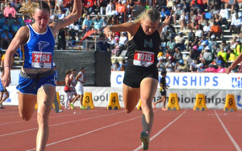 (COLTON MCWILLIAMS | CONTRIBUTED PHOTO) Catherine Youngblood competes in the 100 meter dash Saturday, May 3 at the state track meet. 