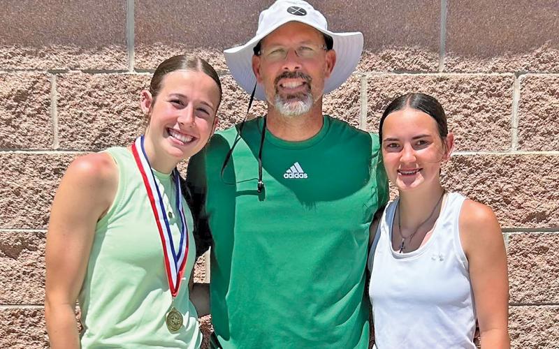 (NEWCASTLE ISD | CONTRIBUTED PHOTO) Mattie Dollar and Rae'Lynn Bennet competed Monday, April 21 in their district tennis meet in Mineral Wells. Dollar advanced to the regional tennis meet that will take place May 7-8 at the Richland Tennis Center in Richland Hills.