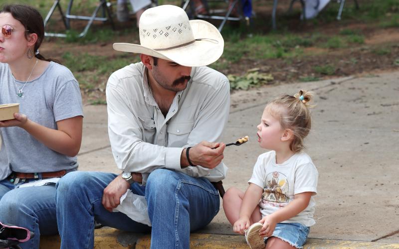 (ARCHIVE PHOTO | THE GRAHAM LEADER) Visitors to the 10th annual Food Truck Championship of Texas stop for a bite from one of the food trucks at the event. The championship will return Saturday, June 6 to downtown Graham. 