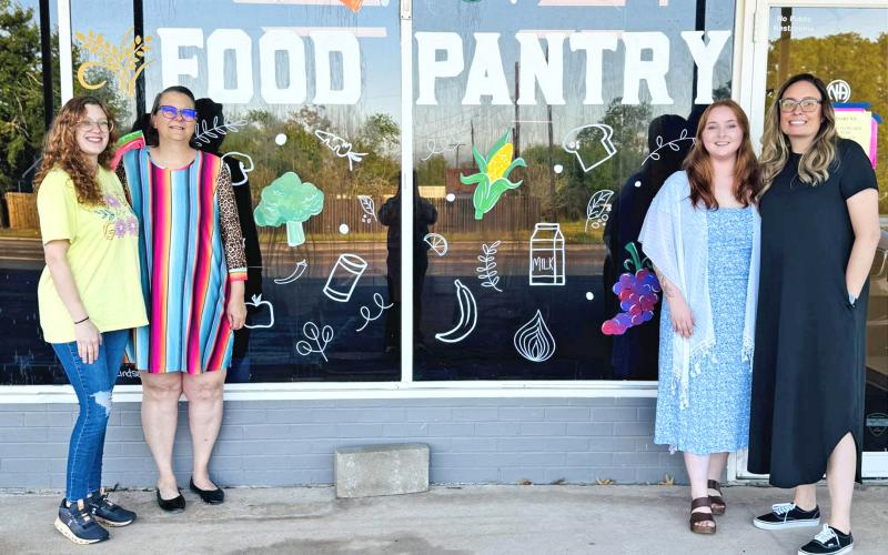 (GRAHAM FOOD PANTRY | CONTRIBUTED PHOTO) The Graham Food Pantry reopened following renovations to serve its clients. Shown from left to right are Graham Crisis Center staff Megan Miles, Stormy Hardin, Shylee Winder and Cassandra Barraza. 
