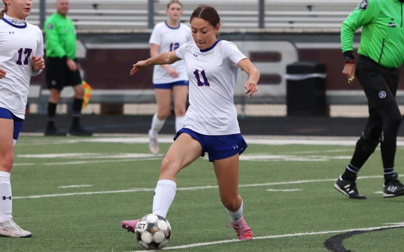 (KYLIE BAILEY | THE GRAHAM LEADER) Marrisa Bueno controls the ball Friday, Feb. 20 against the Bridgeport Lady Bulls. Bueno was a key contributor in the Lady Blues 3-0 victory during that matchup.