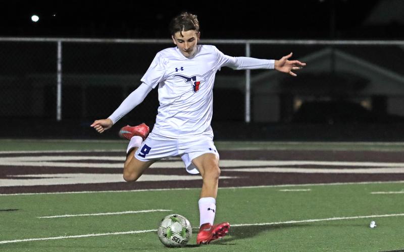(KYLIE BAILEY | THE GRAHAM LEADER) Nolan Wankowicz kicks the ball into the field in one of the Steers previous matchups. After a wild final week of district play, the Steers clinched a playoff spot for the second season in a row. 