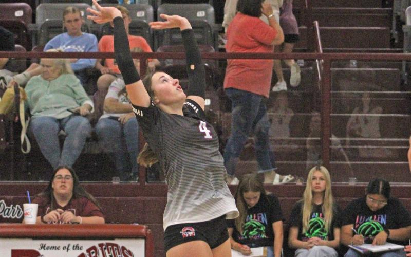 (ALEX HAVARDANSKY | THE GRAHAM LEADER) Hadleigh Allen sets a ball for the Lady Blues in their match Tuesday, Sept. 9, against Bowie. Allen also picked up a key ace in set four to win the match.