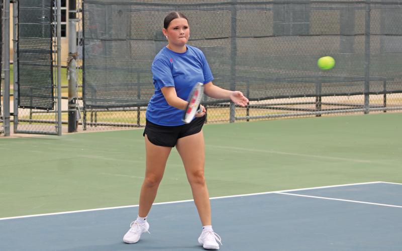 (ALEX HAVARDANSKY | THE GRAHAM LEADER) Hope Jones follows through after making contact with a ball Friday, Aug. 1. Jones picked up a narrow 9-8 win over her Peaster singles opponent in a tie breaker. 