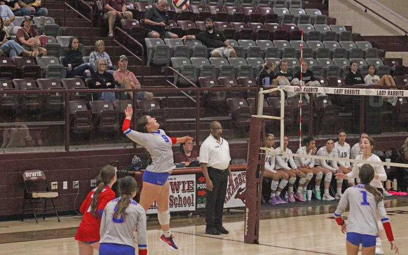 (ALEX HAVARDANKSY | THE GRAHAM LEADER) Hudson Wright goes up for a kill Tuesday, Sept. 9, against the Bowie Lady Rabbits. Wright got the final kill of the night for the Lady Blues to pick up the win. 